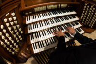 Organist Playing Pipe Organ